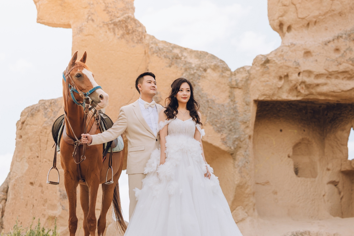 Cappadocia Pre-Wedding Photoshoot Hot Air Balloons Red Convertible Cave Hotel Roof Turkish Fairy Lamps Salt Lake by Aric on OneThreeOneFour 10