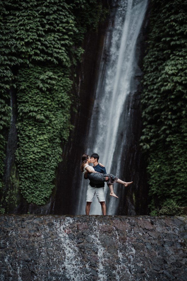 C&K: Hong Kong Couple's pre-wedding photoshoot in Bali at Lake Tamblingan, waterfall, Bali swings and beach by Hendra on OneThreeOneFour 28