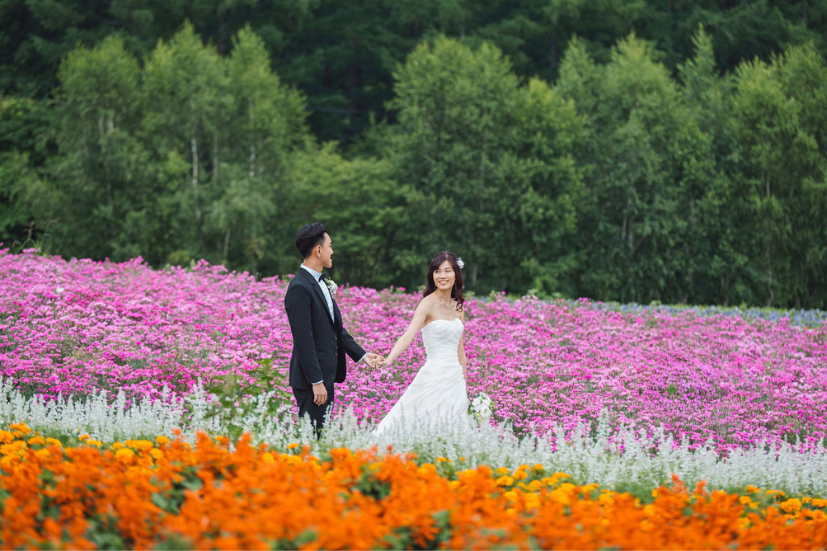 Hokkaido Prewedding Photoshoot In Summer At Blue Pond, Hinode Park Lavender And Shikisai No Oka Flower Fields by Kuma on OneThreeOneFour 3