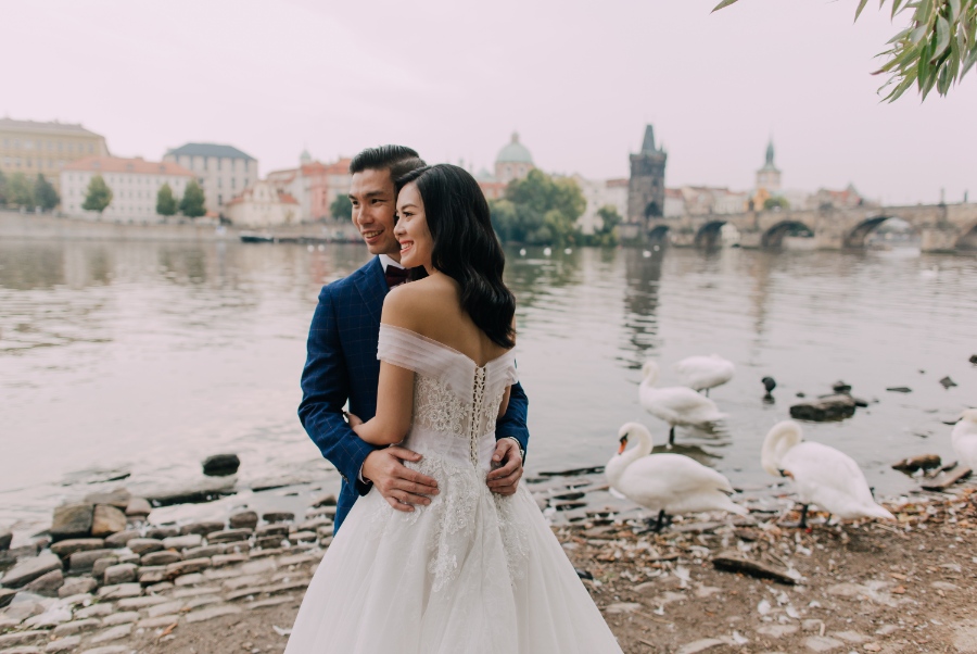 Prague Czech Republic Adventurous prewedding photography with swans, mechanical clock, at Old Town Hall by Nika on OneThreeOneFour 26