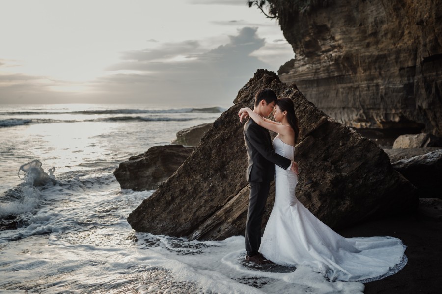 C&K: Hong Kong Couple's pre-wedding photoshoot in Bali at Lake Tamblingan, waterfall, Bali swings and beach by Hendra on OneThreeOneFour 41