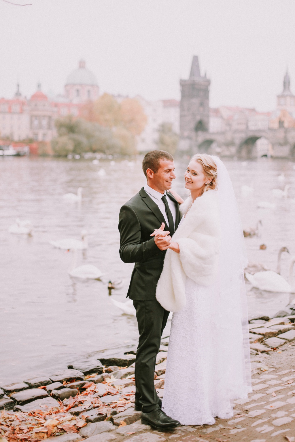 Prague Wedding Photoshoot in Autumn At Old Town Square, Charles Bridge And Astronomical Clock by Vickie  on OneThreeOneFour 8