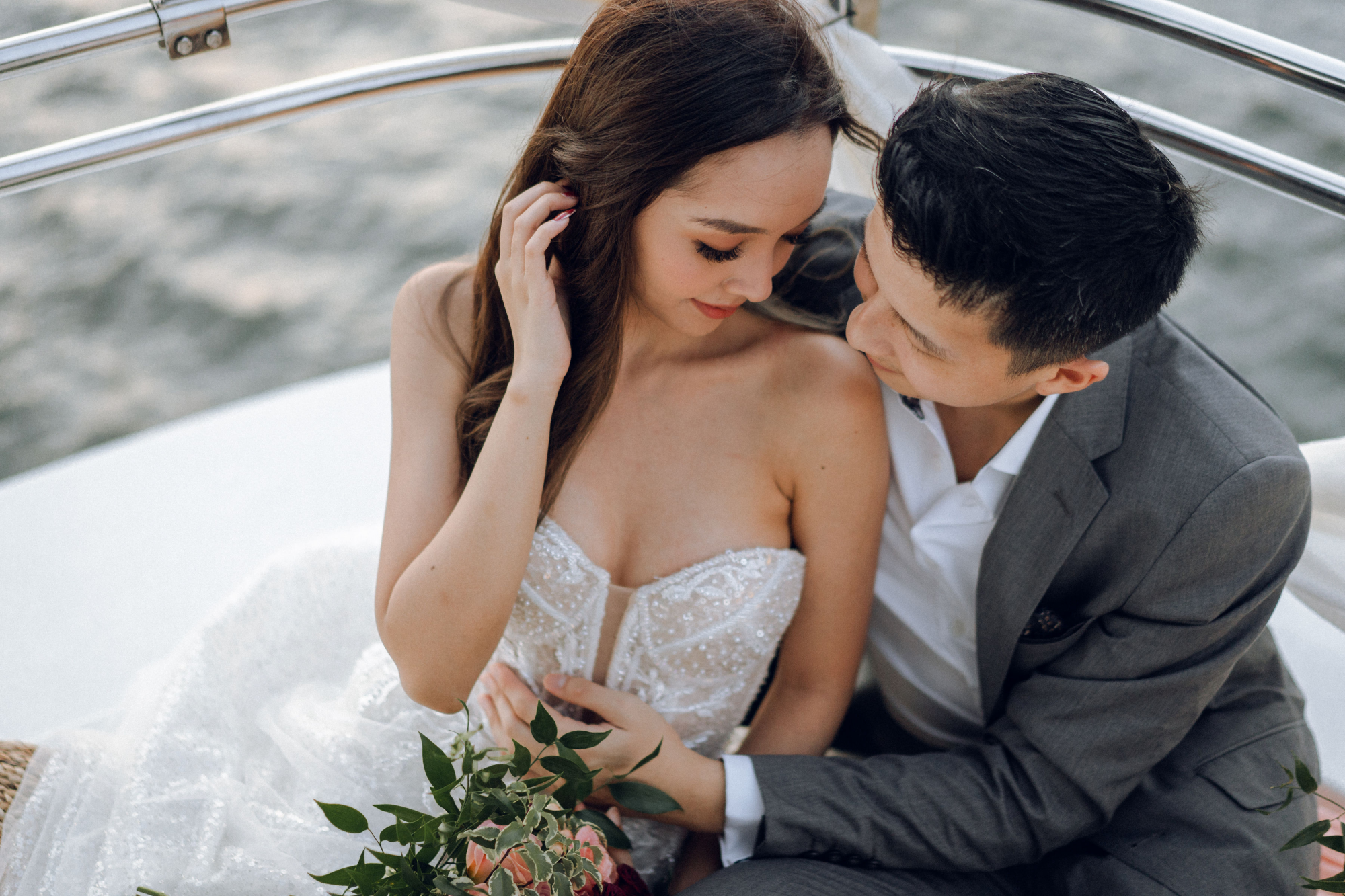 Sunset Prewedding Photoshoot On A Yacht With Romantic Floral Styling by Samantha on OneThreeOneFour 20