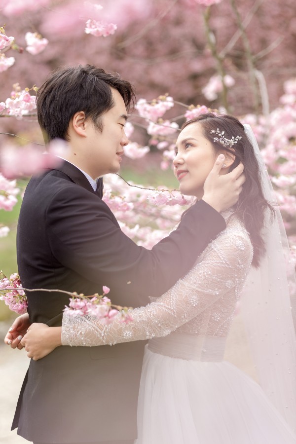 W&J: Pre-wedding in Spring with cherry blossom and snow by Fei on OneThreeOneFour 2