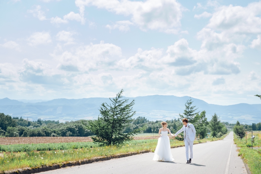 Romantic Summer Escape: Anthony & Gracie's Pre-Wedding Photoshoot in Hokkaido's Lavender Fields and Blue Ponds by Kuma on OneThreeOneFour 14