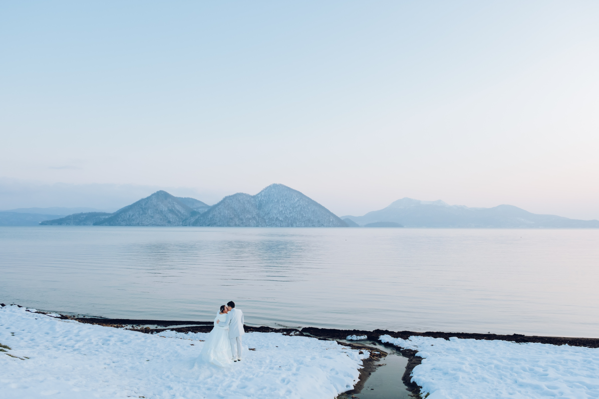 Hokkaido Prewedding Photoshoot At Lake Toya, Hilton Niseko Village And Kimono Shoot In Kaributo Shrine In Winter by Kuma on OneThreeOneFour 24