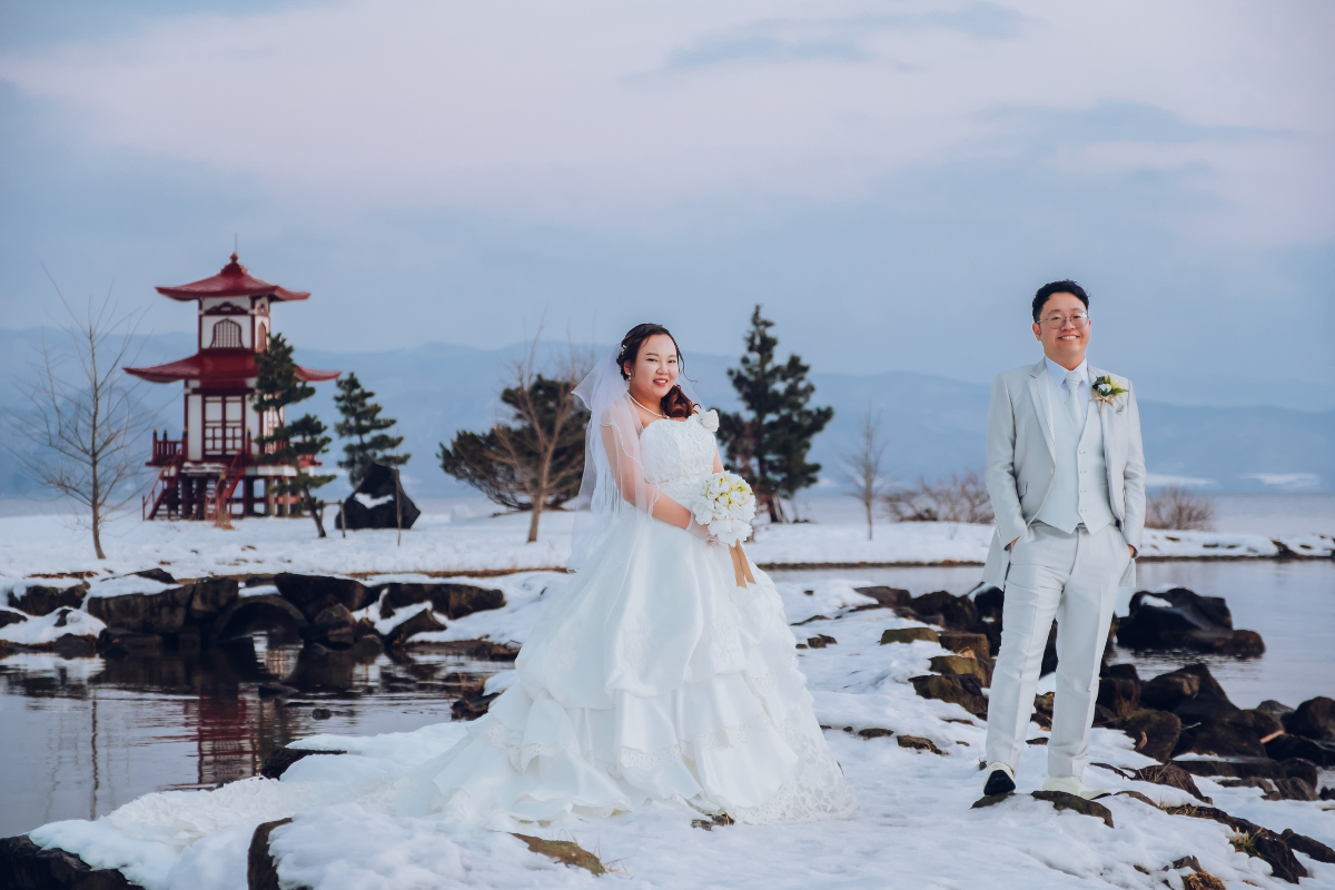 Hokkaido Prewedding Photoshoot At Lake Toya, Hilton Niseko Village And Kimono Shoot In Kaributo Shrine In Winter by Kuma on OneThreeOneFour 23