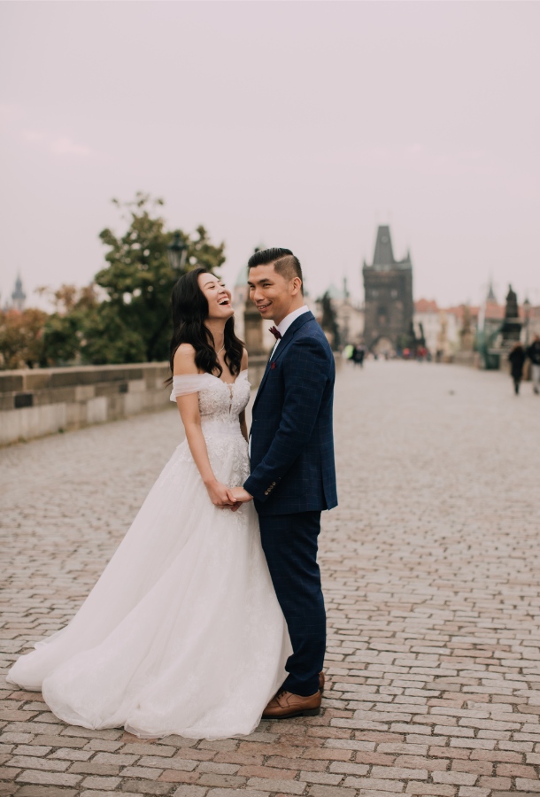 Prague Czech Republic Adventurous prewedding photography with swans, mechanical clock, at Old Town Hall by Nika on OneThreeOneFour 19