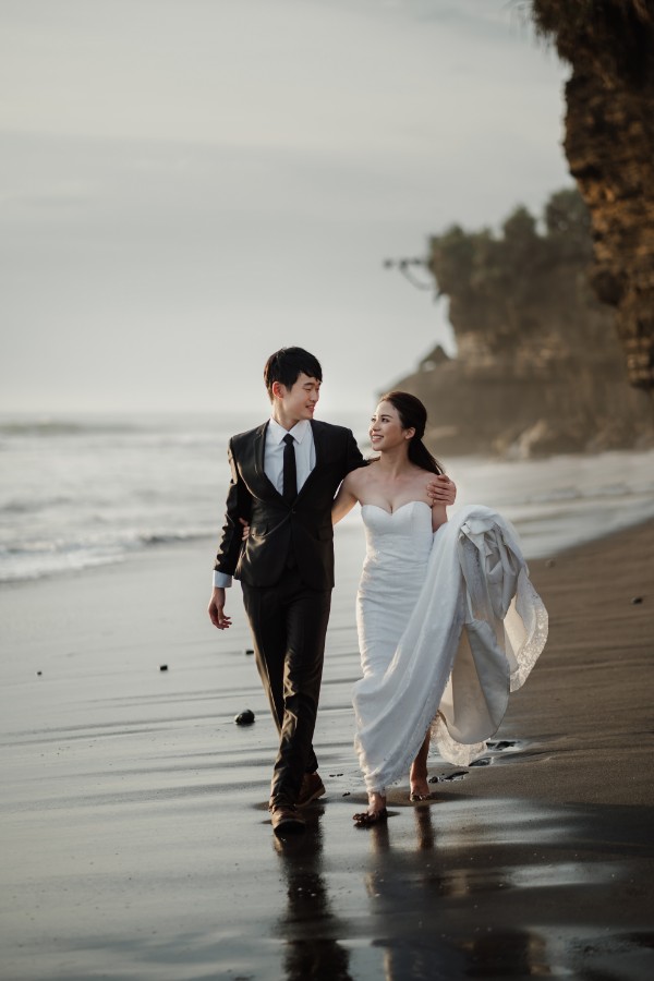 C&K: Hong Kong Couple's pre-wedding photoshoot in Bali at Lake Tamblingan, waterfall, Bali swings and beach by Hendra on OneThreeOneFour 34