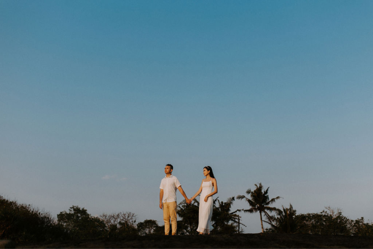 Bali Prewedding Photoshoot At Mount Batur Pinggan Viewpoint, Marigold Field, Pine Forest and nyanyi beach by Cahya on OneThreeOneFour 39