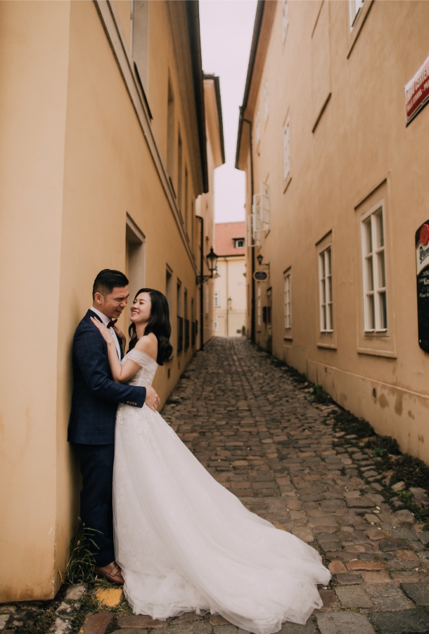 Prague Czech Republic Adventurous prewedding photography with swans, mechanical clock, at Old Town Hall by Nika on OneThreeOneFour 22
