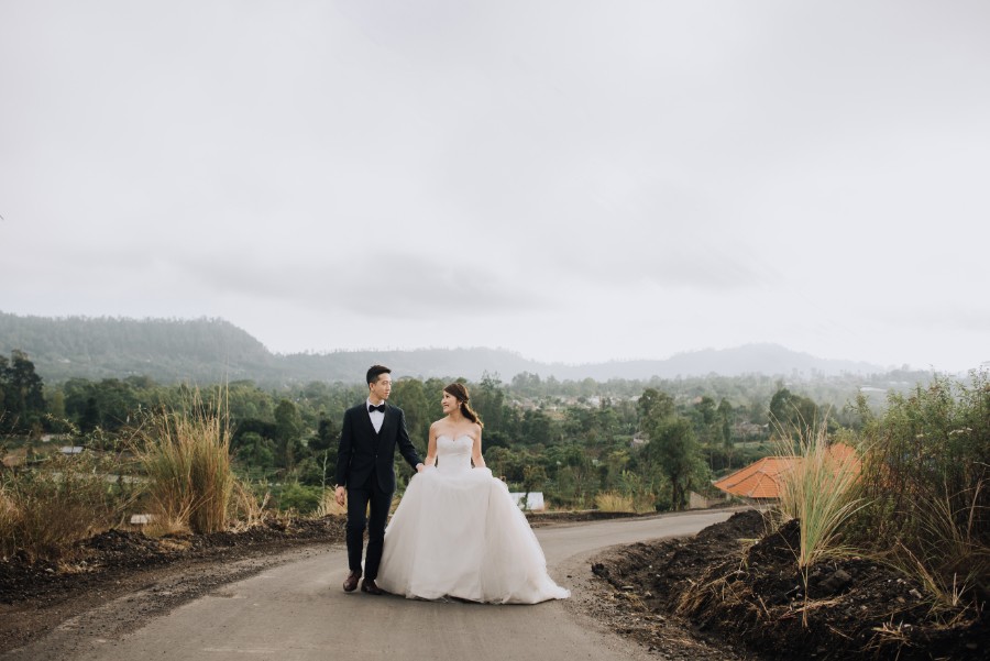 G&G: Bali Pre-wedding photoshoot at Mount Batur Pinggan, forest, Cepung Waterfall and Mengening Beach by Hery on OneThreeOneFour 4