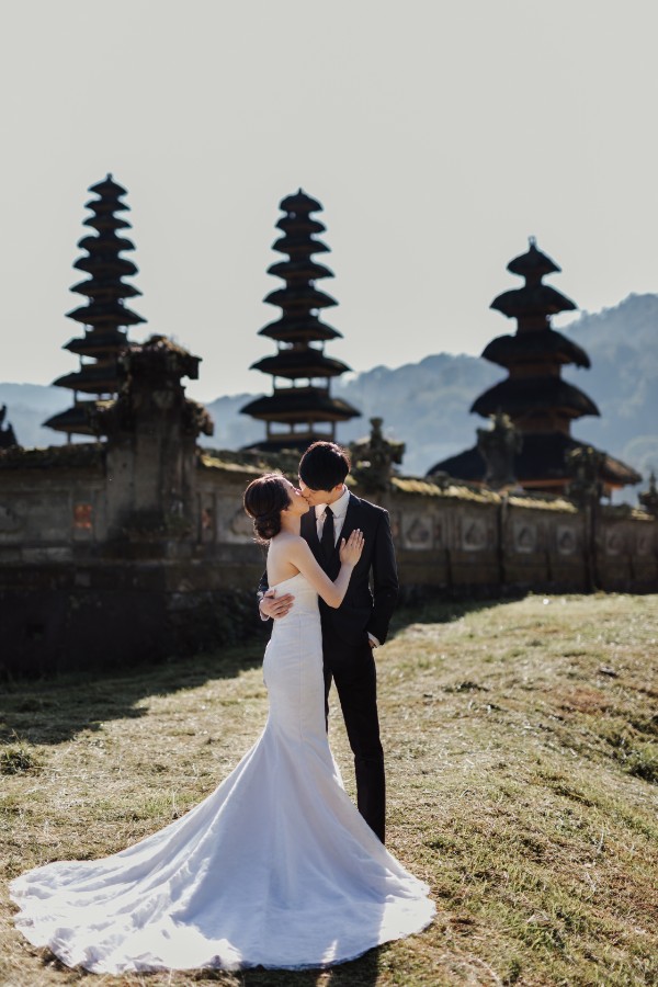 C&K: Hong Kong Couple's pre-wedding photoshoot in Bali at Lake Tamblingan, waterfall, Bali swings and beach by Hendra on OneThreeOneFour 12
