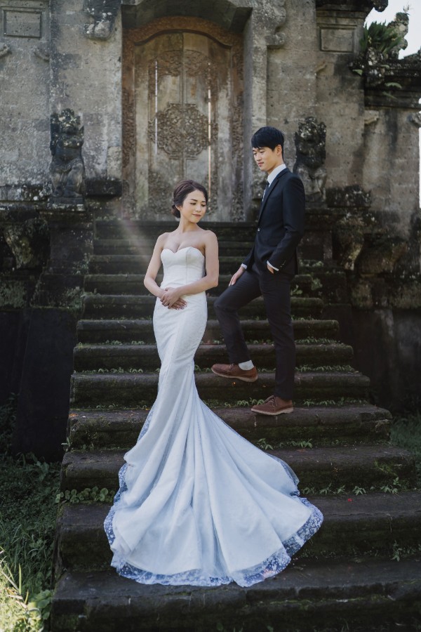 C&K: Hong Kong Couple's pre-wedding photoshoot in Bali at Lake Tamblingan, waterfall, Bali swings and beach by Hendra on OneThreeOneFour 15