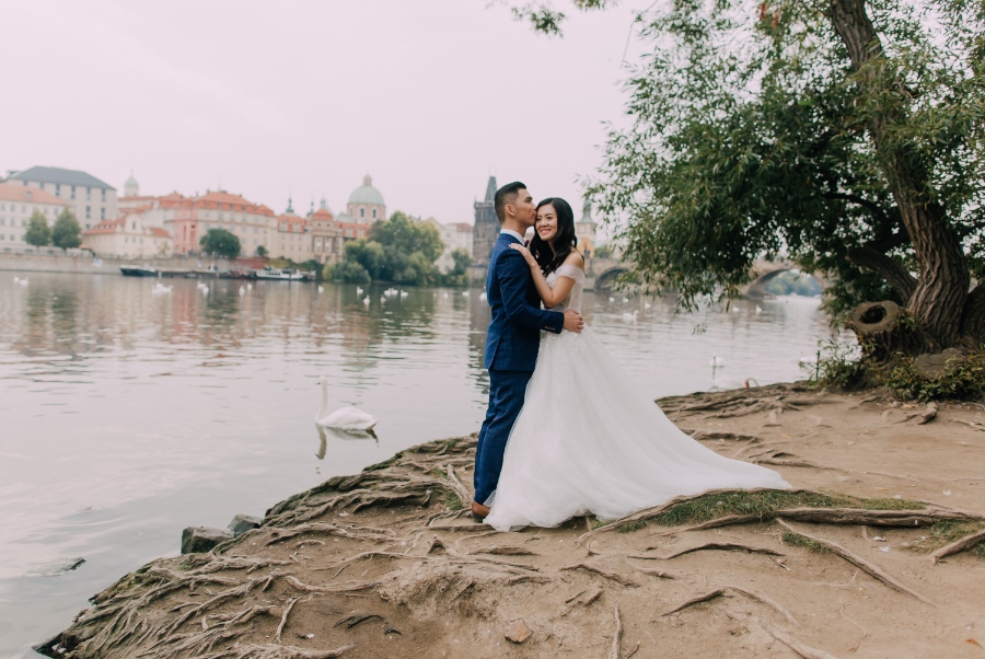 Prague Czech Republic Adventurous prewedding photography with swans, mechanical clock, at Old Town Hall by Nika on OneThreeOneFour 24