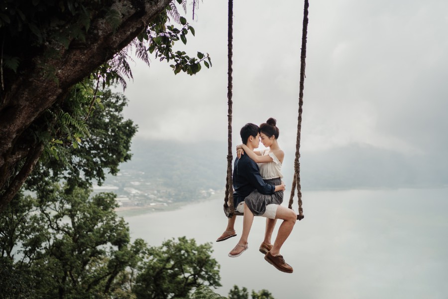 C&K: Hong Kong Couple's pre-wedding photoshoot in Bali at Lake Tamblingan, waterfall, Bali swings and beach by Hendra on OneThreeOneFour 29