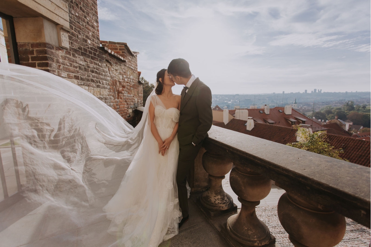 Prague Pre-Wedding Photoshoot with Old Town Square, Astronomical Clock, Charles Bridge and St Vitus Cathedral by Nika on OneThreeOneFour 14