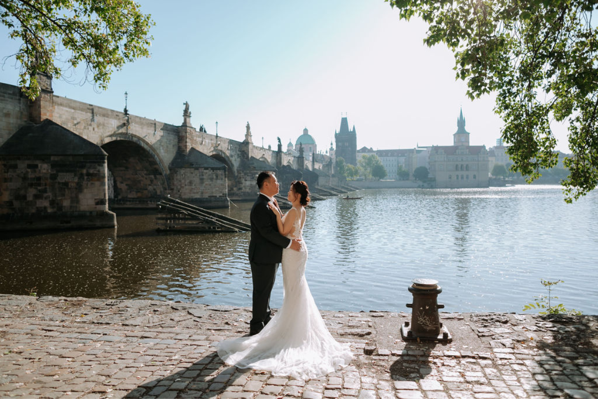 Prague prewedding photoshoot at St Vitus Cathedral, Charles Bridge, Vltava Riverside and Old Town Square Astronomical Clock by Nika on OneThreeOneFour 16