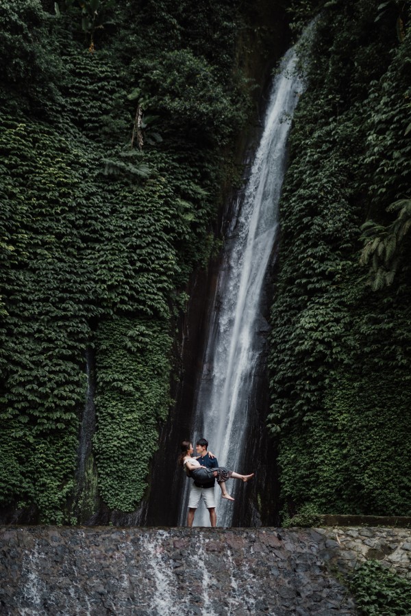 C&K: Hong Kong Couple's pre-wedding photoshoot in Bali at Lake Tamblingan, waterfall, Bali swings and beach by Hendra on OneThreeOneFour 27
