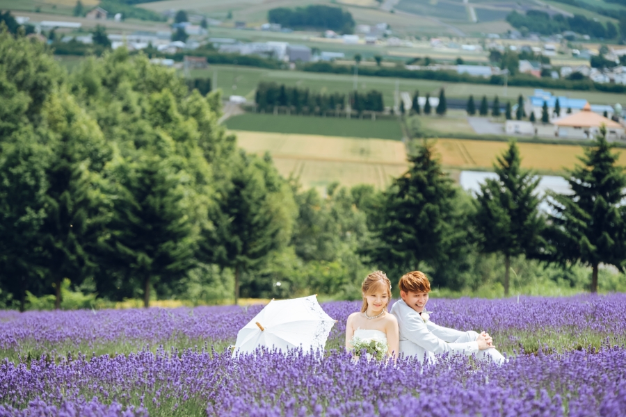 Romantic Summer Escape: Anthony & Gracie's Pre-Wedding Photoshoot in Hokkaido's Lavender Fields and Blue Ponds by Kuma on OneThreeOneFour 4
