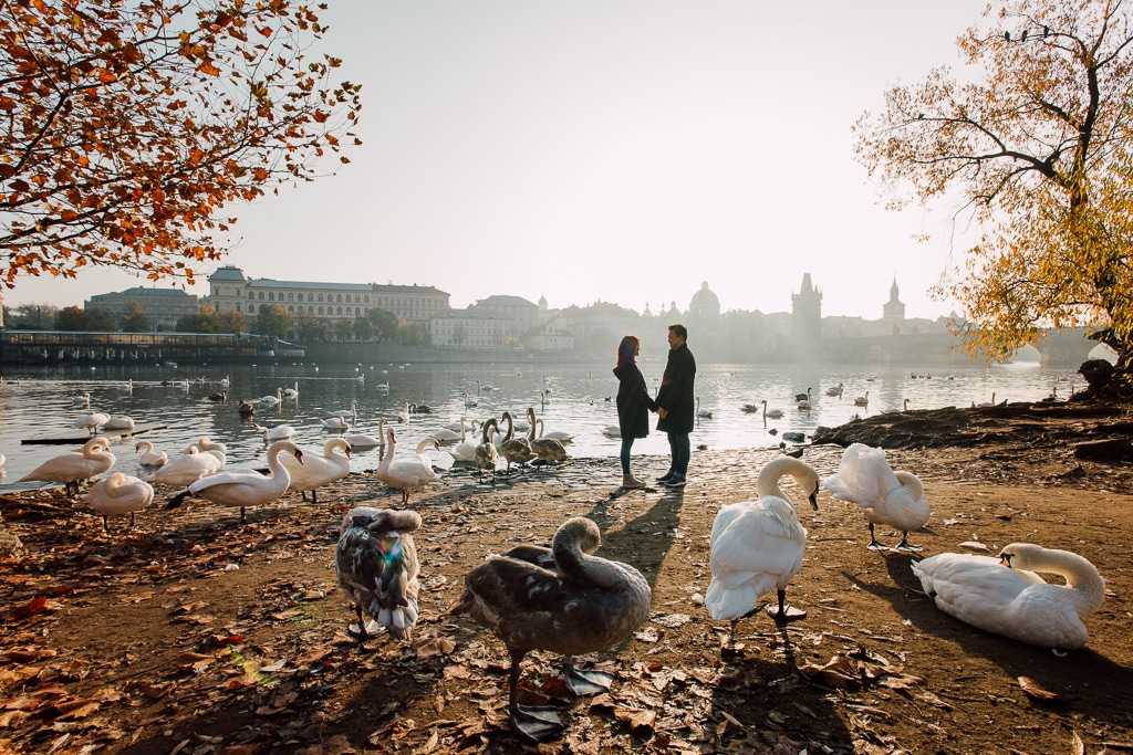 W&H Surprise Proposal Prague Photographer | Charles Bridge, Riverside by Nika on OneThreeOneFour 9