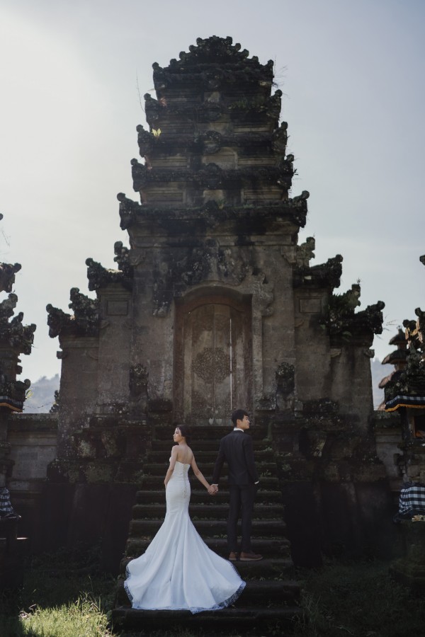 C&K: Hong Kong Couple's pre-wedding photoshoot in Bali at Lake Tamblingan, waterfall, Bali swings and beach by Hendra on OneThreeOneFour 14