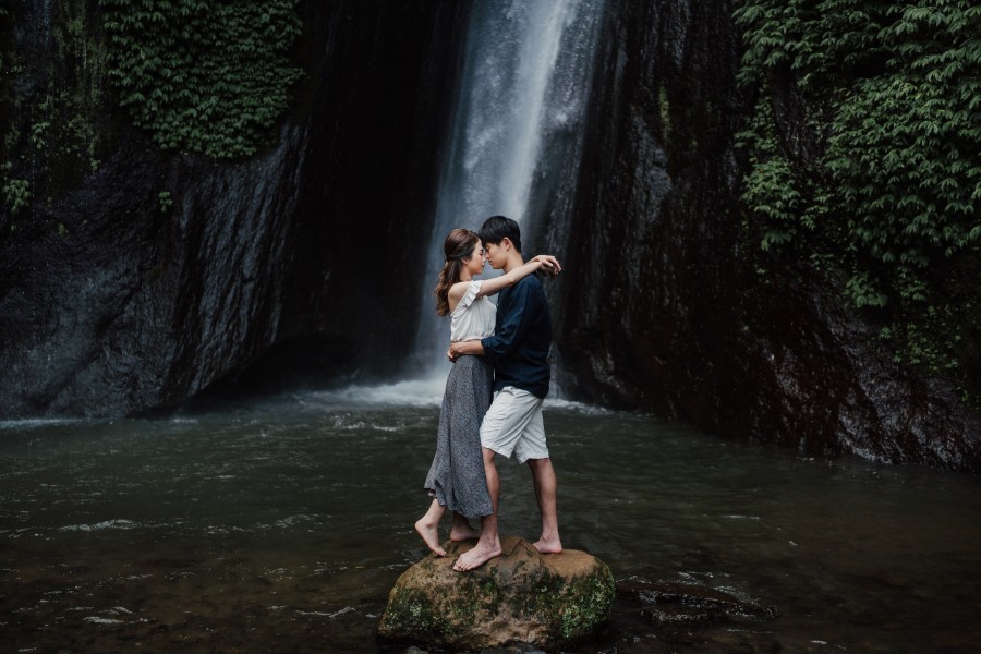 C&K: Hong Kong Couple's pre-wedding photoshoot in Bali at Lake Tamblingan, waterfall, Bali swings and beach by Hendra on OneThreeOneFour 24