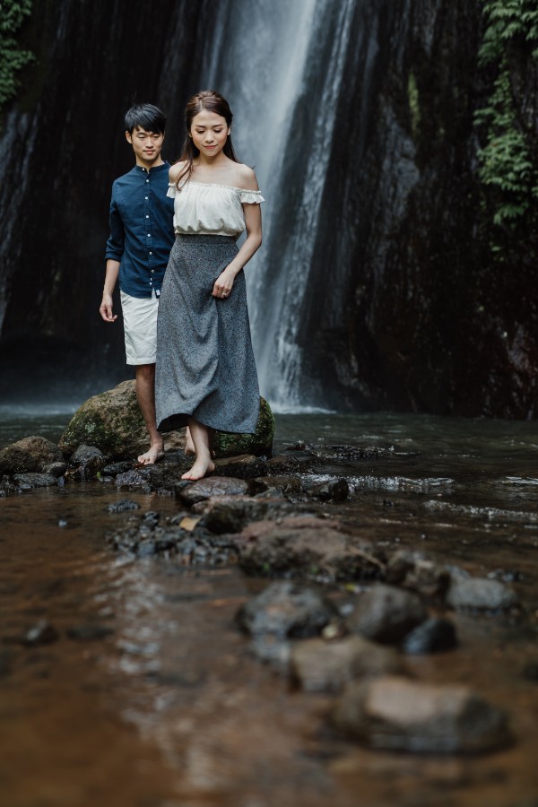 C&K: Hong Kong Couple's pre-wedding photoshoot in Bali at Lake Tamblingan, waterfall, Bali swings and beach by Hendra on OneThreeOneFour 26