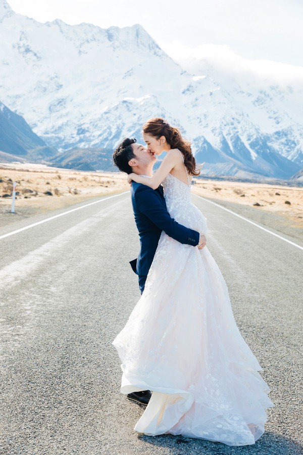 New Zealand Pre-Wedding Photoshoot of R&C: at Alpaca farm, Coromandel Peak, Lake Pukaki, Lake Tekapo, Mt Cook during cherry blossom season by Fei on OneThreeOneFour 30