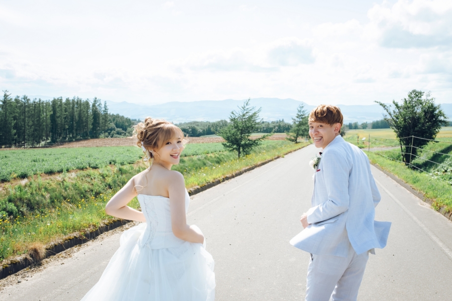 Romantic Summer Escape: Anthony & Gracie's Pre-Wedding Photoshoot in Hokkaido's Lavender Fields and Blue Ponds by Kuma on OneThreeOneFour 17