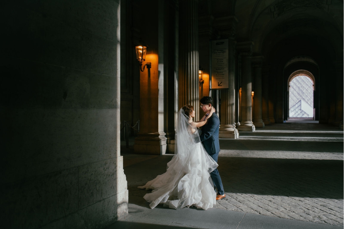 Paris Pre-Wedding Photoshoot with Avenue de Camoens, Port Debily, Bir Hakeim, Tuileries Garden, Louvre Pyramid, Palais Royal, and a Parisian Cafe. by Arnel on OneThreeOneFour 17