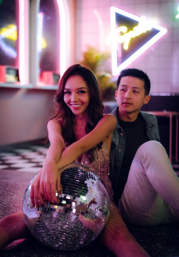 Trippy Disco Themed Casual Couple Photoshoot At A Neon Bar