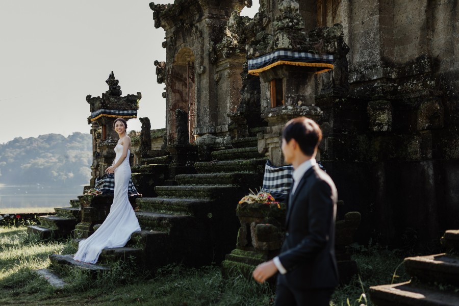 C&K: Hong Kong Couple's pre-wedding photoshoot in Bali at Lake Tamblingan, waterfall, Bali swings and beach by Hendra on OneThreeOneFour 13