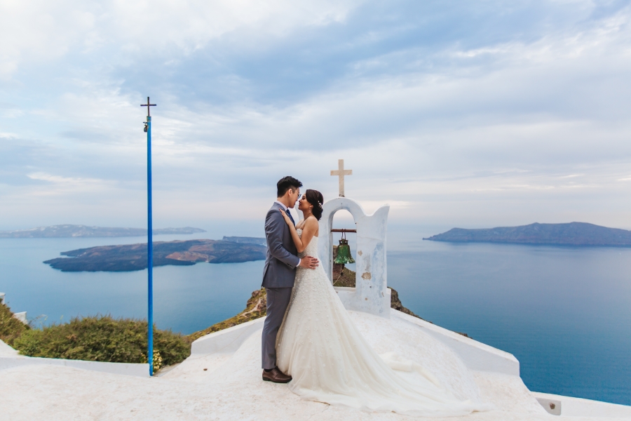 Santorini Pre-Wedding Photographer: Engagement Photoshoot In Oia During Sunset by Nabi on OneThreeOneFour 14
