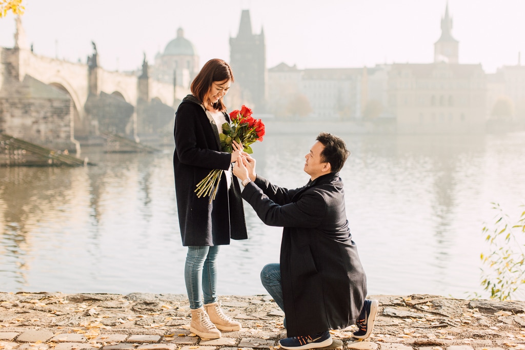 W&H Surprise Proposal Prague Photographer | Charles Bridge, Riverside by Nika on OneThreeOneFour 18