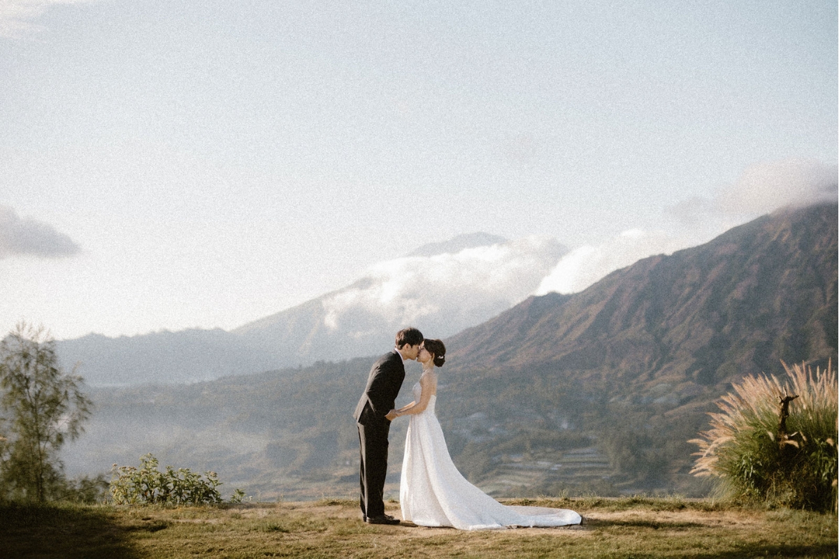 Bali Pre-Wedding Photoshoot with Mt . Batur, Tegenungan Waterfalls, and Twin Cliff Valley by Cahya on OneThreeOneFour 7