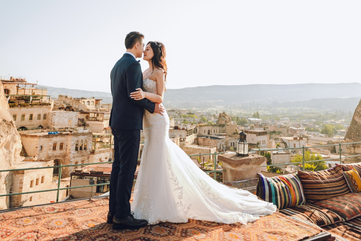 Cappadocia Pre-Wedding Photoshoot Hot Air Balloons Red Convertible Cave Hotel Roof Turkish Fairy Lamps Salt Lake by Aric on OneThreeOneFour 8