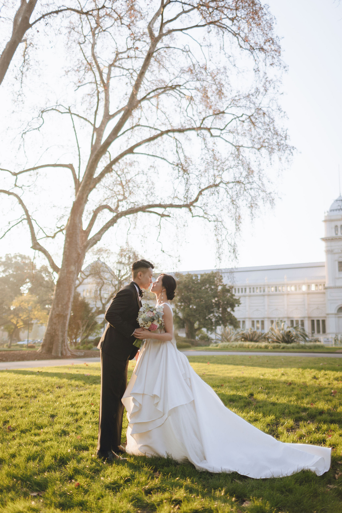 Melbourne Pre-Wedding Photoshoot | Cafe, Redwood Forest, City Streets & Carlton Gardens at Carlton Gardens pre-wedding photo