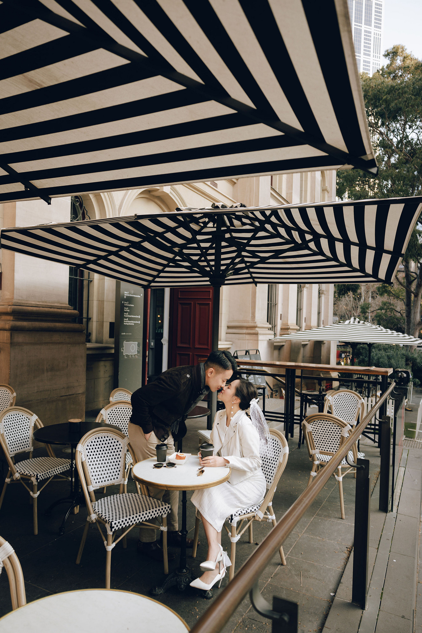 Melbourne Pre-Wedding Photoshoot | Cafe, Redwood Forest, City Streets & Carlton Gardens at City Cafe pre-wedding photo