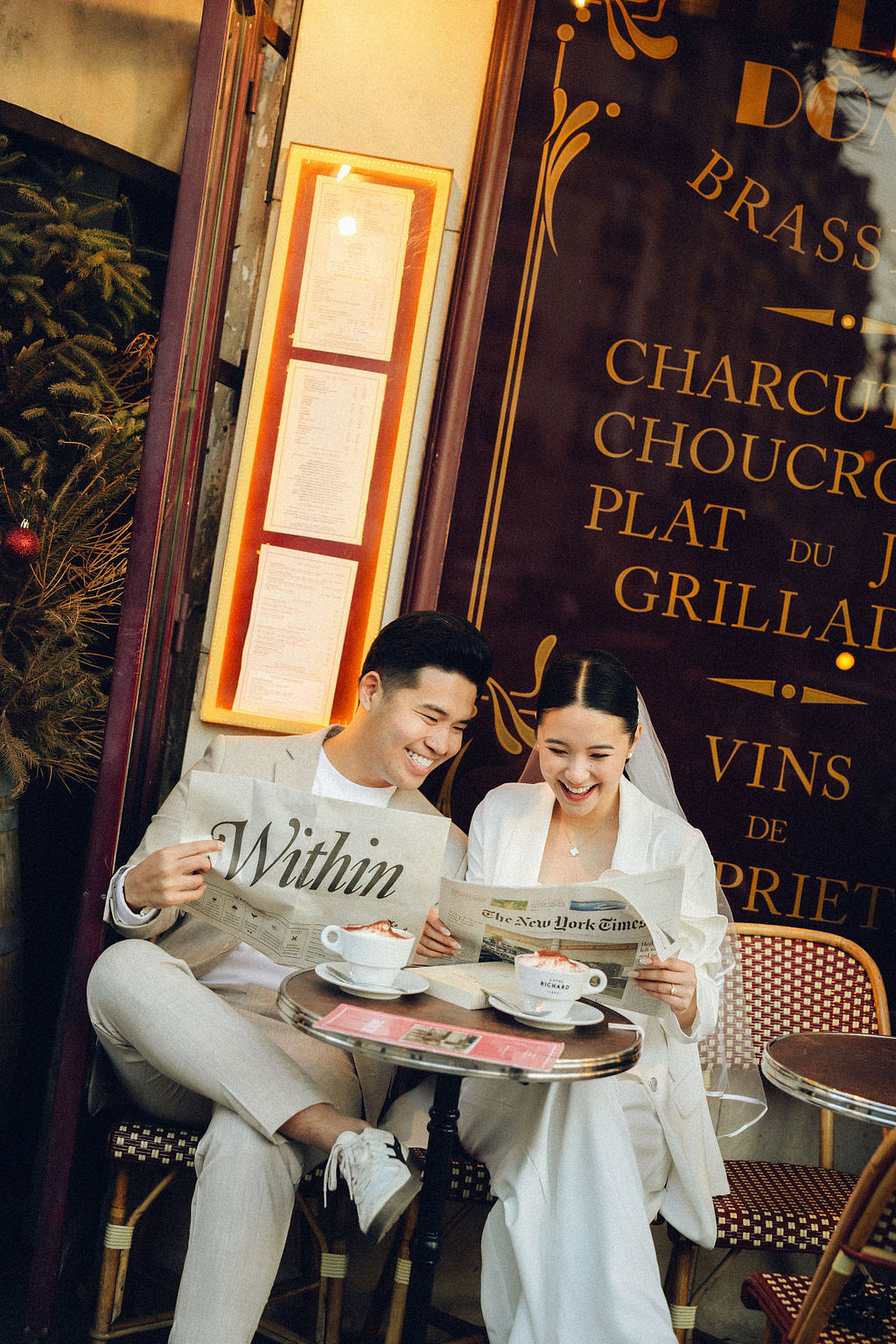Paris Pre-Wedding Photoshoot with Eiﬀel Tower Louvre Museum Parisian Cafe Vintage Car Rooftop Night at Parisian Café pre-wedding photo