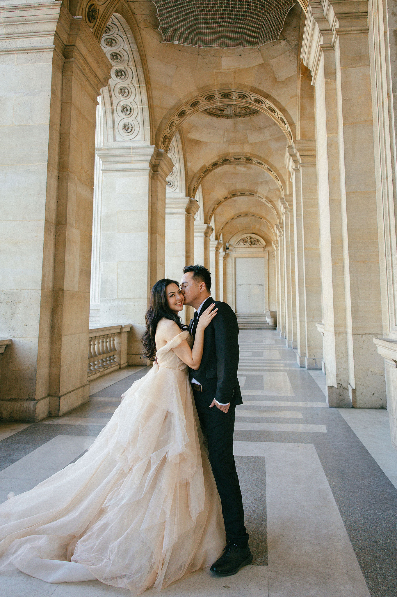 Paris Autumn Pre-Wedding Photoshoot | Avenue de Camoëns, Tuileries Garden, Louvre, Pont Alexandre III & Bir-Hakeim Bridge at Louvre pre-wedding photo