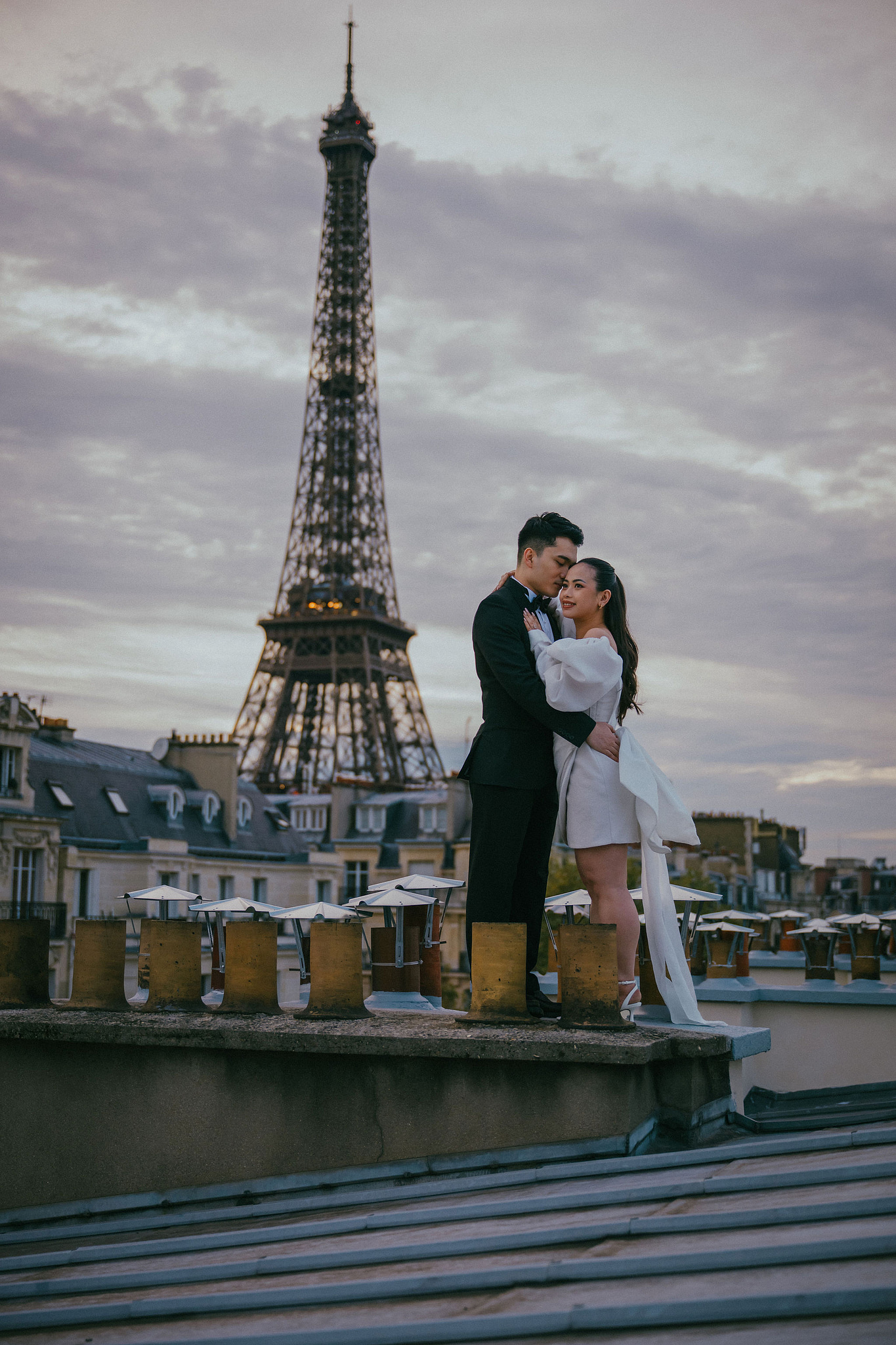 Paris Pre-Wedding Photoshoot | Trocadéro, Vintage Car, Parisian Café, Paris Rooftop & Louvre at Paris Rooftop pre-wedding photo