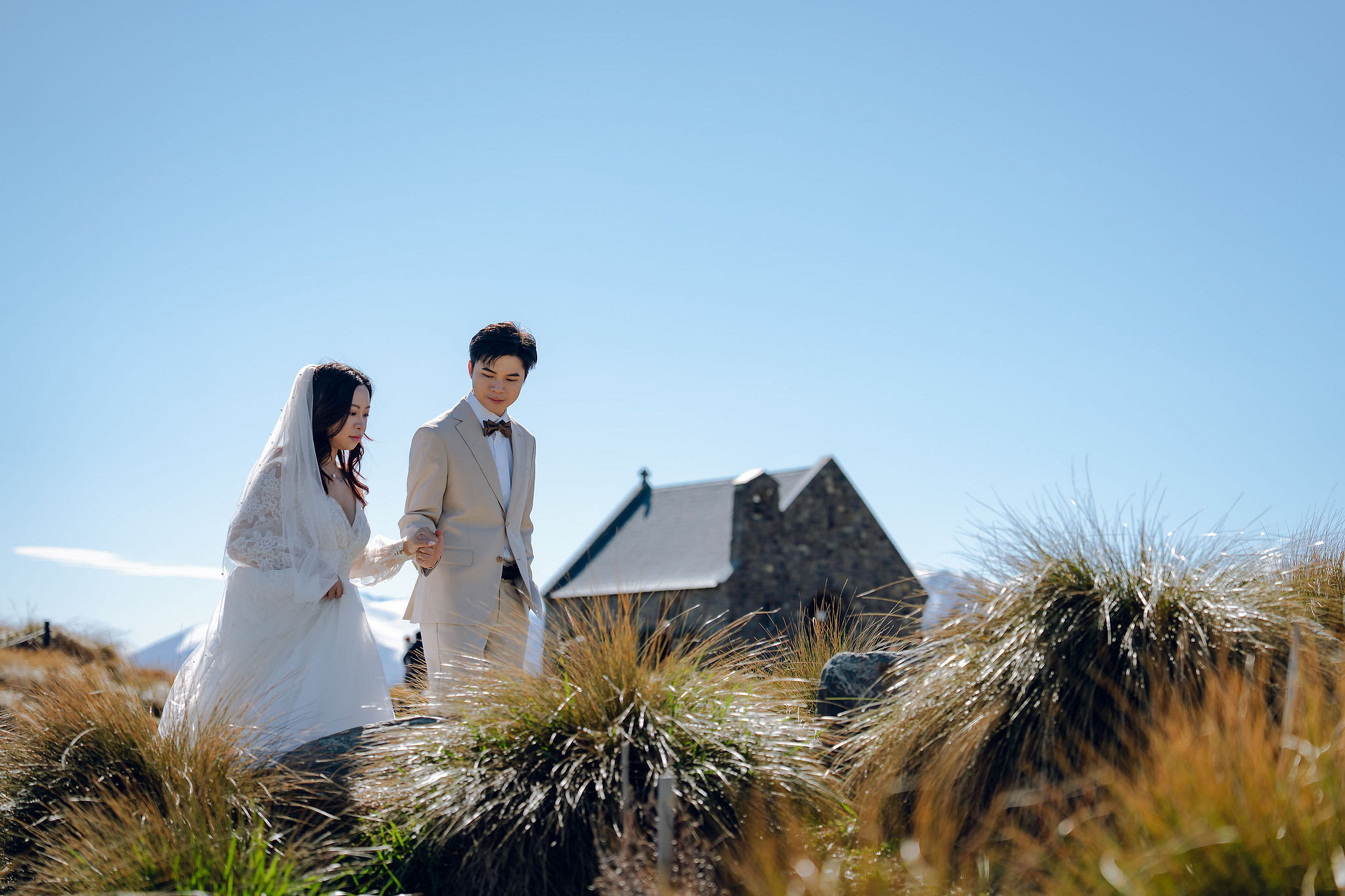 New Zealand Pre-Wedding Photoshoot | Lake Wakatipu, Alta Tarns, Coromandel Peak to Mount Cook at Church of the Good Shepherd pre-wedding photo