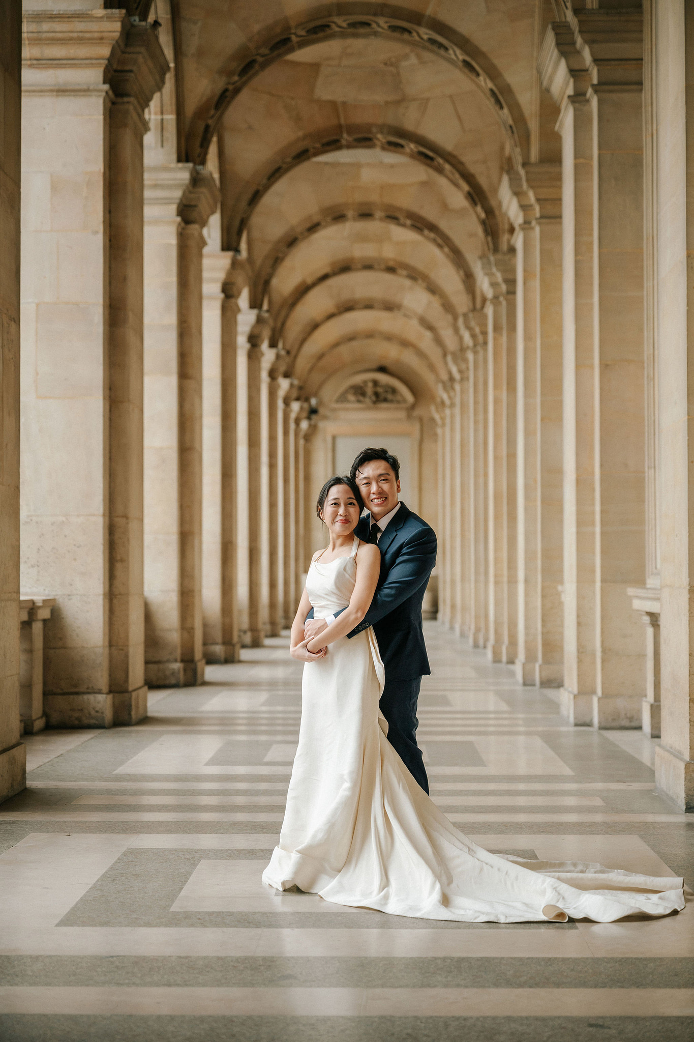 Paris Pre-Wedding Photoshoot | Place du Trocadéro, Bir-Hakeim Bridge, Louvre Pyramid, Tuileries Garden & Montmartre at Louvre Pyramid pre-wedding photo