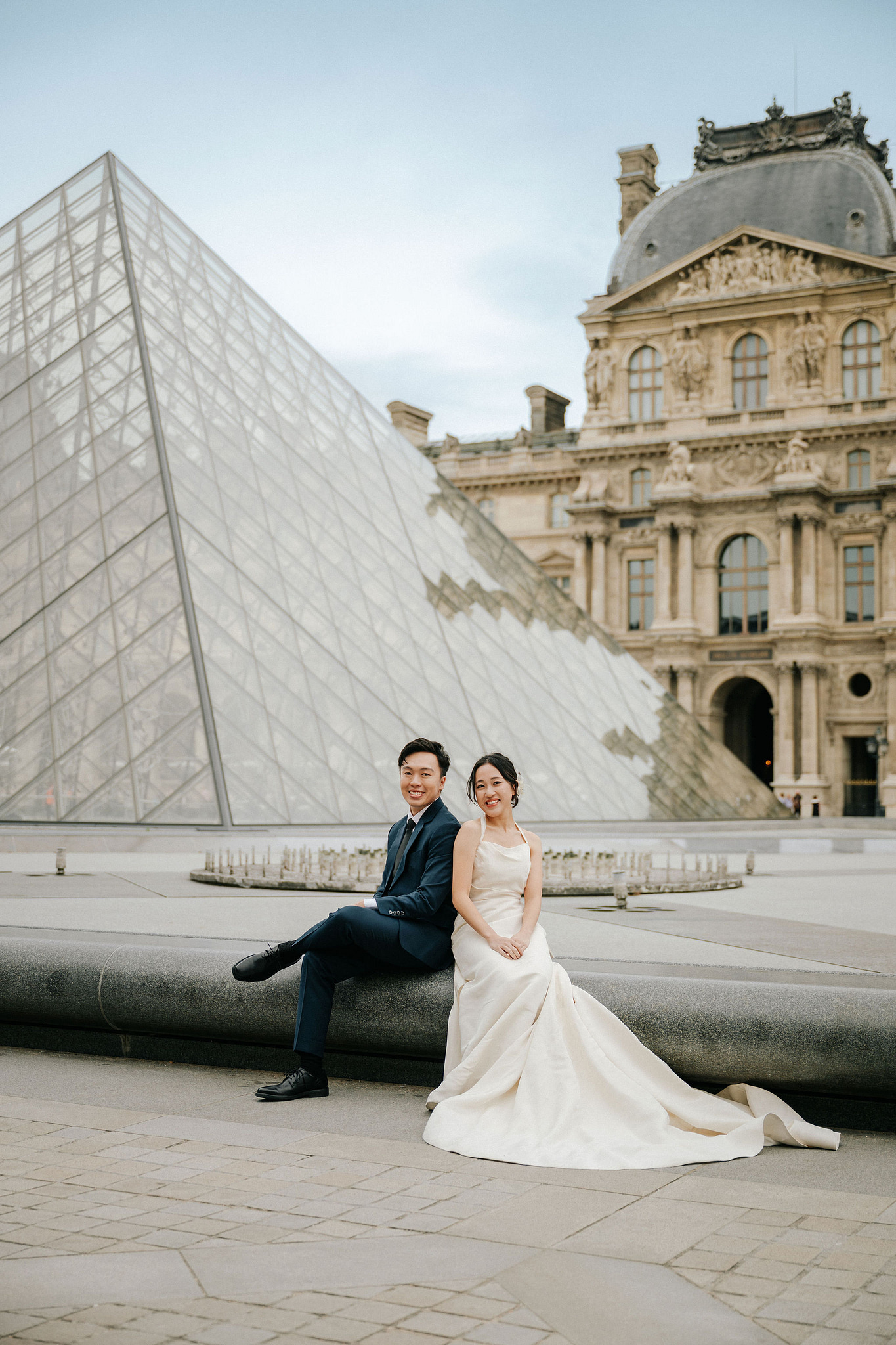 Paris Pre-Wedding Photoshoot | Place du Trocadéro, Bir-Hakeim Bridge, Louvre Pyramid, Tuileries Garden & Montmartre at Louvre Pyramid pre-wedding photo