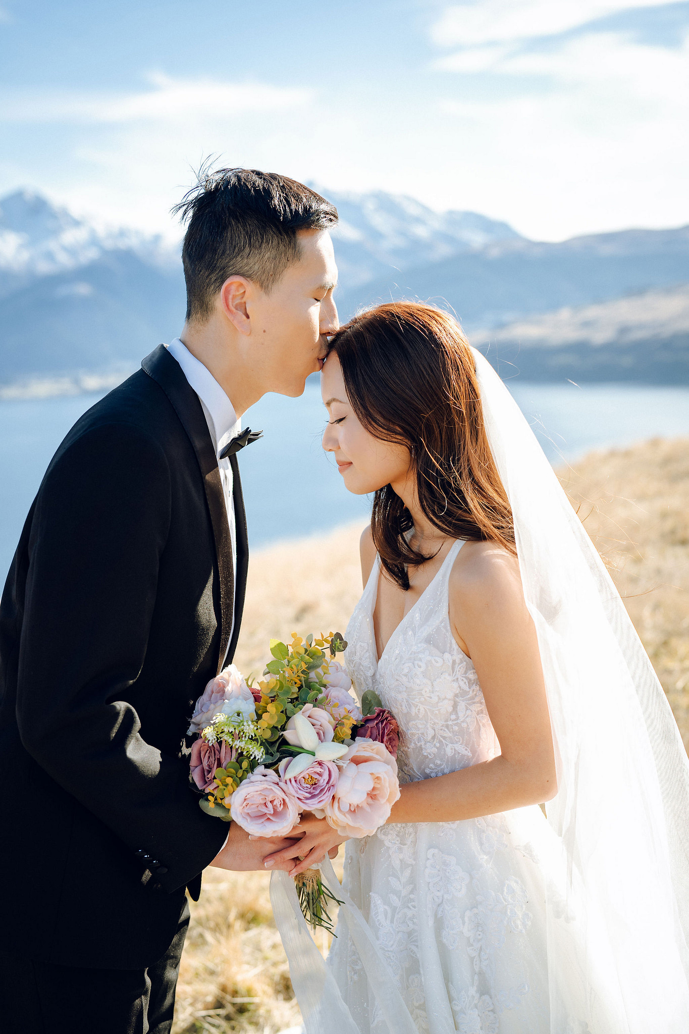 New Zealand Pre-Wedding Photoshoot with Lake Wakatipu, Skippers Canyon, Lake Tekapo, Mount Cook, and Omarama Clay Cliffs at Lake Wakatipu pre-wedding photo