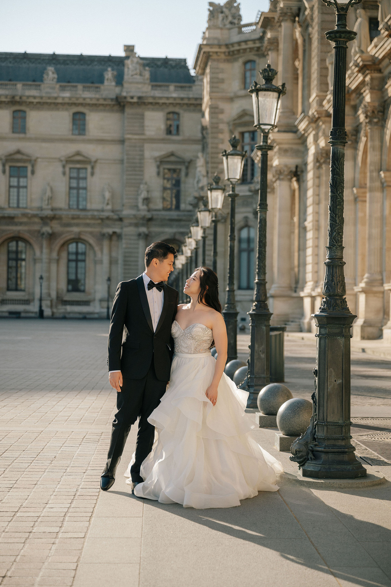 Paris Pre-Wedding Photoshoot | Place du Trocadéro, Port Debilly, Louvre, Parisian Streets & Bir-Hakeim Bridge at Louvre pre-wedding photo