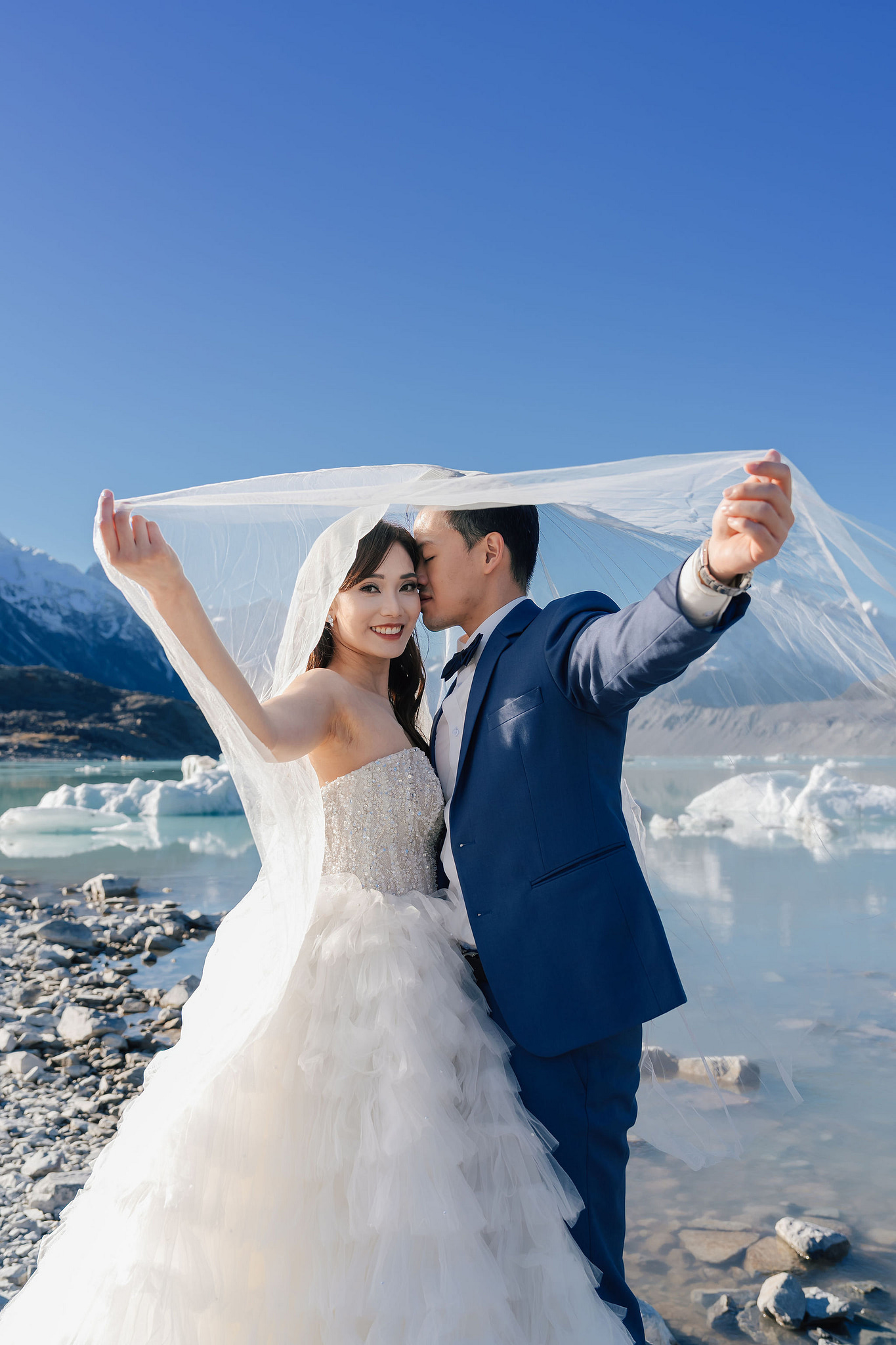New Zealand Pre-Wedding Photoshoot | Coromandel Peak, Lake Wakatipu & Queenstown, Skippers Canyon, Lake Tekapo, Mount Cook National Park & Glacier at Glacier pre-wedding photo