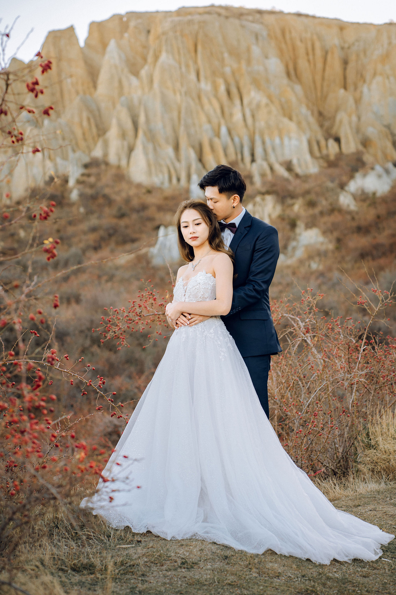 New Zealand Pre-Wedding Photoshoot | Alpaca Farm, Mt John, Lake Tekapo, Mount Cook National Park, Glacier Lake & Omarama Clay Cliffs at Omarama Clay Cliffs pre-wedding photo