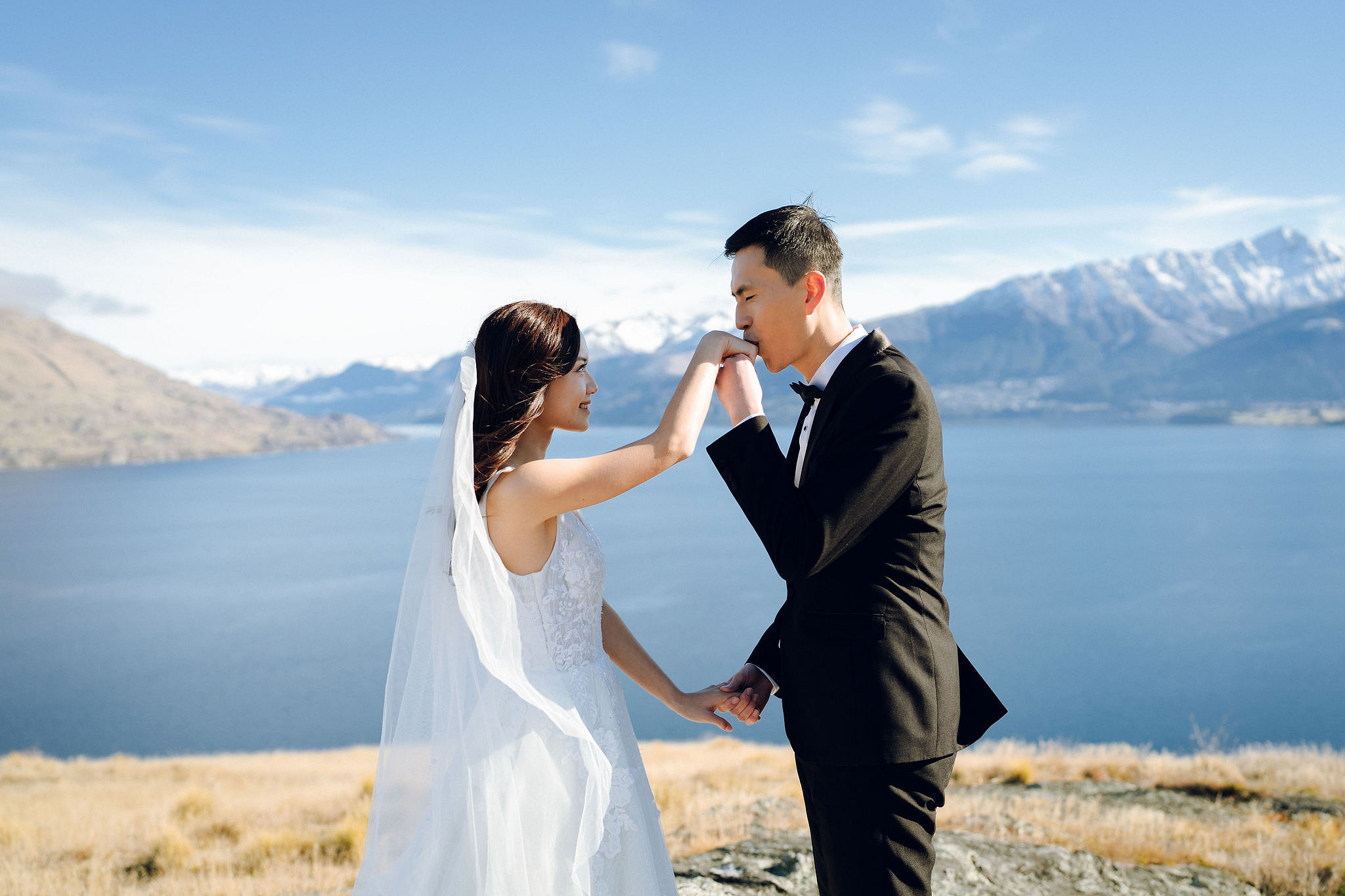 New Zealand Pre-Wedding Photoshoot with Lake Wakatipu, Skippers Canyon, Lake Tekapo, Mount Cook, and Omarama Clay Cliffs at Lake Wakatipu pre-wedding photo